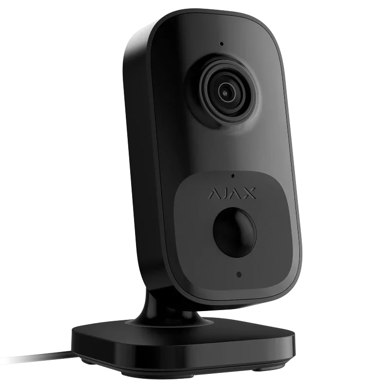 Sort overvåkningskamera med linse og sensor, passende for sikkerhet og overvåkning hjemme.