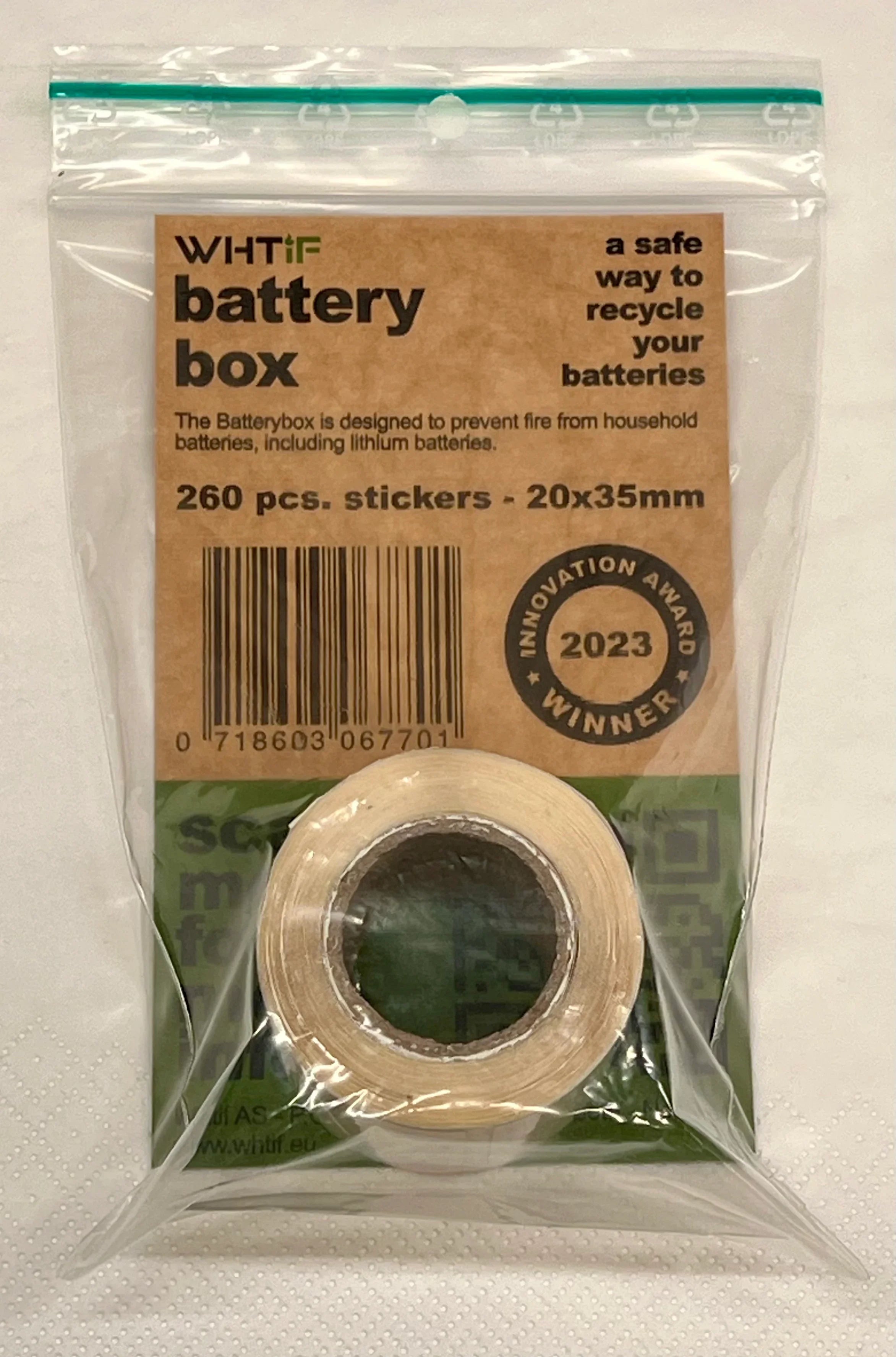 Rull med sikkerhetsklistremerker for batterier, 260 stk, pakket i gjennomsiktig pose.