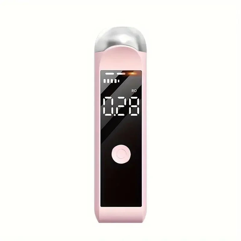 Digital alkometer i rosa med display som viser promille, måleinstrument for promillemåling
